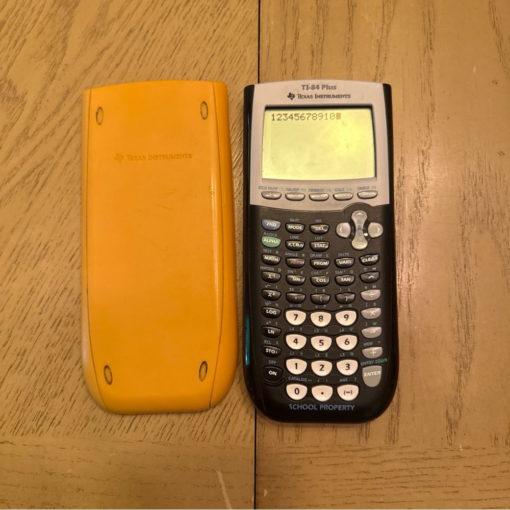 Texas Instruments Black and Yellow Graphing Calculator